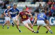 24 May 2015; Niall O'Brien, Westmeath, in action against Joe Campion, left, and John A Delaney, Laois. Leinster GAA Hurling Senior Championship Qualifier Group, Round 3, Laois v Westmeath. O'Moore Park, Portlaoise, Co. Laois. Picture credit: Brendan Moran / SPORTSFILE