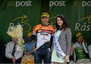 21 May 2015; Third across the line Matteo Malucelli, Team IDEA-CONAD, with Miss An Post Rás Donna McCaffrey following Stage 5 of the 2015 An Post Rás. Newport - Ballina. Photo by Sportsfile