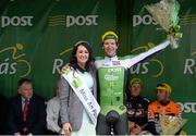 21 May 2015; Stage winner Aaron Gate, An Post Chain Reaction, with Miss An Post Rás Donna McCaffrey following Stage 5 of the 2015 An Post Rás. Newport - Ballina. Photo by Sportsfile