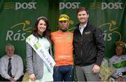 21 May 2015; Marco Tizza, Team IDEA 2010 ASD, after receiving The LeasePlan Stage Jersey from Miss An Post Rás Donna McCaffrey and John Inglis, Senior Technical Manager LeasePlan, following Stage 5 of the 2015 An Post Rás. Newport - Ballina. Photo by Sportsfile