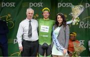 21 May 2015; Aaron Gate, An Post Chain reaction, after receiving the Post Office Sprint Jersey Classification from Miss An Post Rás Donna McCaffrey and Chris Flynn, Acting Branch Manager, An Post, Ballina, following Stage 5 of the 2015 An Post Rás. Newport - Ballina. Photo by Sportsfile