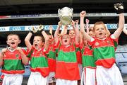 10 July 2008; The players from Rathnew, Co. Wicklow, lift the Liam MacCarthy cup during the Leinster - Play and Stay with GAA Go Games activity day which saw over 700 children under the age of 8 take part in games in both hurling and football on six pitches at Croke Park, Dublin. Picture credit: Pat Murphy / SPORTSFILE
