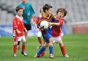 10 July 2008; Adam Hanvey, Scoil Ui Conail, Dublin, in action against Aodhan Houritan, St. Brigids, Blanchardstown, Dublin, in the Leinster - Play and Stay with GAA Go Games activity day which saw over 700 children under the age of 8 take part in games in both hurling and football on six pitches at Croke Park, Dublin. Picture credit: Pat Murphy / SPORTSFILE