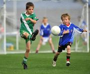 10 July 2008; Gavin Kearns, Sarsfields, in action against Taaffe, Celbridge, right, during the Leinster - Play and Stay with GAA Go Games activity day which saw over 700 children take part in games in both hurling and football on six pitches at Croke Park, Dublin. Picture credit: Pat Murphy / SPORTSFILE