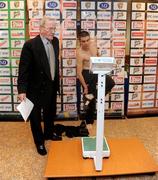 11 July 2008; Boxing Union of Ireland official Tony Lee looks on as Bernard Dunne prepares to check his weight about 10 minutes before the official weigh-in ahead of the Hunky Dory's Fight Night this Saturday July 12th at the National Stadium, Dublin. Burlington Hotel, Dublin. Picture credit: Ray McManus / SPORTSFILE