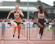 12 July 2008; Ireland's Derval O'Rourke races for the line on her way to second place behind Jamaica's Andrea Bliss, right, in the Cork City Sports Women's 100m hurdles. Cork City Sports, The Mardyke, Cork. Picture credit: Pat Murphy / SPORTSFILE