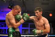 12 July 2008; Andrew Murray, right, lands a punch on Peter McDonagh. Irish Lightweight Championship, Hunky Dory Fight Night, Irish Lighweight Championship, National Stadium, Dublin. Picture credit: Ray Lohan / SPORTSFILE *** Local Caption ***