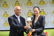 13 July 2008; Winning owner, Lady O'Reilly, is presented with the trophy by Druba Selvaratnam, of Jebel Ali Racecourse and Stables after winning The Jebel Ali Stables & Racecourse European Breeders Fund Maiden. The Curragh Racecourse, Co. Kildare. Picture credit: Damien Eagers / SPORTSFILE
