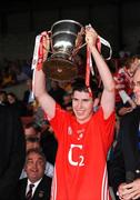 13 July 2008; Daniel Roche, Cork, lifts the cup after victory over Tipperary. ESB Munster Minor Hurling Championship Final, Tipperary v Cork, Gaelic Grounds, Limerick. Picture credit: Pat Murphy / SPORTSFILE