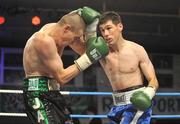 12 July 2008; Peter McDonagh, right, lands a punch on Andrew Murray, Irish Lightweight Championship, Hunky Dory Fight Night, Irish Lighweight Championship, National Stadium, Dublin. Picture credit: Ray Lohan / SPORTSFILE *** Local Caption ***