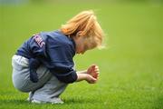 13 July 2008; Erin Doyle Martin, Pearse Street, Dublin, busies herself collecting grass during one of her matches. Gaelic 4 Girls, National Blitz Day, Croke Park, Dublin. Picture credit: Brian Lawless / SPORTSFILE