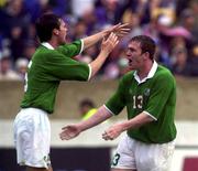 4 June 2000; Richard Dunne celebrates with his Republic of Ireland team-mate Gary Breen, left, after scoring their opening goal during the US Nike Cup game between Republic of Ireland and Mexico at Soldier Field in Chicago, Illnois, USA. Photo by David Maher/Sportsfile