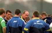 4 February 2000; Clare manager Cyril Lyons speaks to his players during a training session. Photo by Aoife Rice/Sportsfile