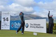 28 May 2015; Rickie Fowler, USA, tees off on the 14th. Dubai Duty Free Irish Open Golf Championship 2015, Day 1. Royal County Down Golf Club, Co. Down. Picture credit: Ramsey Cardy / SPORTSFILE