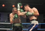 12 July 2008; Andrew Murray, right, lands a punch on Peter McDonagh. Irish Lightweight Championship, Hunky Dory Fight Night, Irish Lighweight Championship, National Stadium, Dublin. Picture credit: Ray Lohan / SPORTSFILE *** Local Caption ***