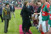 13 July 2008; President of Ireland Mary McAleese is introduced to the Mayo team while her Aide-de-camp Niamh O'Mahony, who is also daughter to Mayo manager John O'Mahony, looks on. GAA Football Connacht Senior Championship Final, Mayo v Galway, McHale Park, Castlebar, Co. Mayo. Picture credit: Ray Ryan / SPORTSFILE