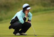 11 July 2008; Titiya Plucksataporn, Thailand, lines up her putt on the 11th green during the AIB Ladies Irish Open Golf Championship. Portmarnock Hotel and Golf Links, Co. Dublin. Picture credit: Stephen McCarthy / SPORTSFILE *** Local Caption *** 11