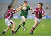 17 July 2008; Niall Heslin, Gorthletra, Leitrim, in action against Gavin Callaghan, left, and James Murray, Tulsk, Roscommon, during the Connacht - Play and Stay with GAA Go Games activity day which saw over 320 children take part in games in both hurling and football on three pitches at Croke Park, Dublin. Picture credit: Brian Lawless / SPORTSFILE