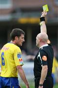 18 July 2008; Referee Richie Winters issues a yellow card to Jason McGuinness, Bohemians. eircom League Premier Division, Derry City v Bohemians, Brandywell, Derry, Co. Derry. Picture credit: Oliver McVeigh / SPORTSFILE