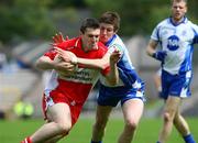 19 July 2008; Mark Lynch, Derry, in action against Darren Hughes, Monaghan. GAA Football All-Ireland Senior Championship Qualifier - Round 1, Monaghan v Derry, Clones, Co. Monaghan. Picture credit: Oliver McVeigh / SPORTSFILE