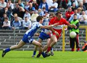 19 July 2008; Paddy Bradley, Derry, in action against Dessie Mone and Darren Hughes, Monaghan. GAA Football All-Ireland Senior Championship Qualifier - Round 1, Monaghan v Derry, Clones, Co. Monaghan. Picture credit: Oliver McVeigh / SPORTSFILE