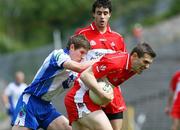 19 July 2008; Mark Lynch, Derry, in action against Darren Hughes, Monaghan. GAA Football All-Ireland Senior Championship Qualifier - Round 1, Monaghan v Derry, Clones, Co. Monaghan. Picture credit: Oliver McVeigh / SPORTSFILE