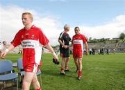 19 July 2008; Derry trainer, John McCloskey, commiserates with Paddy Bradley as he leaves the field, Derry. GAA Football All-Ireland Senior Championship Qualifier - Round 1, Monaghan v Derry. Clones, Co. Monaghan. Picture credit: Oliver McVeigh / SPORTSFILE