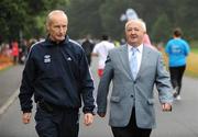 12 July 2008; Race Director Jim Aughney, left, and Irish Runner editor Frank Greally at the start of the Lifestyle Sports - adidas Irish Runner Challenge. Phoenix Park, Dublin. Picture credit: Ray McManus / SPORTSFILE