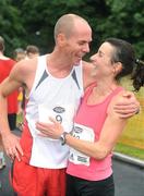 12 July 2008; The first lady home Annette Kealy, Raheny Shamrock AC, is congratulated by her husband Eoin Brady after she won the Lifestyle Sports - adidas Irish Runner Challenge. Phoenix Park, Dublin. Picture credit: Ray McManus / SPORTSFILE