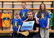 2 June 2015; Tipperary hurler Noel McGrath with children, from left, Oran, Ciara and Shona Murray, all from Letterkenny, Co. Donegal, at the launch of a new charity partnership between the GPA and Childhood Cancer Foundation. Croke Park, Dublin. Picture credit: Ramsey Cardy / SPORTSFILE