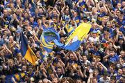 13 July 2008; Tipperary supporters celebrate after the game. GAA Hurling Munster Senior Championship Final, Tipperary v Clare, Gaelic Grounds, Limerick. Picture credit: Ray McManus / SPORTSFILE