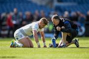 16 May 2015; Ian Madigan, Leinster, is attended to by Garreth Farrell, Leinster team physiotherapist,. Guinness PRO12, Round 22, Edinburgh v Leinster. BT Murrayfield, Edinburgh, Scotland. Picture credit: Stephen McCarthy / SPORTSFILE