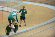 6 August 2008; Coach Tommy Evans watches David O'Loughlin, from Cong, Co. Mayo, during a  training session in advance of the Games which open on Friday. Speaking after training David said &quot; I was sixth in the World Championships, so I'd like to improve on that. My personal best for the Individual Sprint is 4:20min, and  I'd like to be down to 4:17min. I'll be a bit better, than I was at the World Championships, and I'll be happy. Beijing 2008 - Games of the XXIX Olympiad, Laoshan Velodrome, Shijingshan District, Beijing, China. Picture credit: Ray McManus / SPORTSFILE