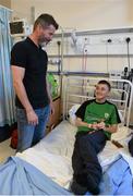 11 June 2015; Republic of Ireland manager Martin O’Neill and assistant manager Roy Keane took time out of their busy preparation for Saturday’s must win qualifier against Scotland to make a very special visit to Temple Street Children’s University Hospital today, where they met brave little patients, along with their parents and staff. The Irish legends made the visit in conjunction with the SportsWorld FAI Summer Soccer Schools, who earlier this year announced Temple Street as their charity of the year. SportsWorld, part of the Heatons department store group, are delighted to be title sponsor of the FAI Summer Soccer Schools. You too can support Temple Street Children’s Hospital by donating €1 when you book your camp online at  www.summersoccerschools.ie Pictured are Republic of Ireland assistant manager Roy Keane with Jack Kelly Smyth, age 14, from Kilmainhamwood, Co. Meath. Temple Street Hospital, Dublin. Picture credit: David Maher / SPORTSFILE