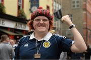 12 June 2015; Scotland supporter Anthony Christie, from South Ayrshire, enjoys the prematch atmosphere around Dublin ahead of tomorrow's European Championship play off between the Republic of Ireland and Scotland at the Aviva Stadium. Temple Bar, Dublin. Picture credit: Piaras Ó Mídheach / SPORTSFILE