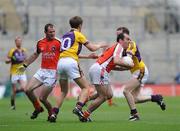 9 August 2008; Martin O'Rourke, Armagh, in action against David Walsh, right, and Redmond Barry, Wexford. GAA Football All-Ireland Senior Championship Quarter-Final, Armagh v Wexford, Croke Park, Dublin. Picture credit: Stephen McCarthy / SPORTSFILE