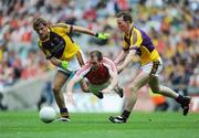 9 August 2008; Ciaran McKeever, Armagh, in action against Brian Malone, left, and Davis Walsh, Wexford. GAA Football All-Ireland Senior Championship Quarter-Final, Armagh v Wexford, Croke Park, Dublin. Picture credit: Stephen McCarthy / SPORTSFILE