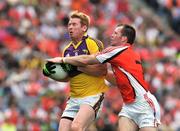 9 August 2008; Eric Bradley, Wexford, in action against Ciaran McKeever, Armagh. GAA Football All-Ireland Senior Championship Quarter-Final, Armagh v Wexford, Croke Park, Dublin. Picture credit: Pat Murphy / SPORTSFILE