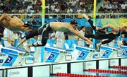 9 August 2008; Ireland's Andrew Bree, centre, in action during his heat of the men's 100m breaststroke in which he set a new national record of 1.01.76. Beijing 2008 - Games of the XXIX Olympiad, National Aquatic Centre, Olympic Green, Beijing, China. Picture credit: Brendan Moran / SPORTSFILE