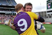 9 August 2008; Wexford goalkeeper Anthony Masterson celebrates with team-mate Brendan Doyle after the game. GAA Football All-Ireland Senior Championship Quarter-Final, Armagh v Wexford, Croke Park, Dublin. Picture credit: Pat Murphy / SPORTSFILE