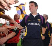 9 August 2008; Wexford manager Jason Ryan is congratuled by supporters after his side's victory. GAA Football All-Ireland Senior Championship Quarter-Final, Armagh v Wexford, Croke Park, Dublin. Picture credit: Stephen McCarthy / SPORTSFILE