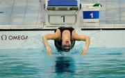 10 August 2008; Ireland's Aisling Cooney in action during her heat of the Women's 100m backstroke. Beijing 2008 - Games of the XXIX Olympiad, National Aquatic Centre, Olympic Green, Beijing, China. Picture credit: Brendan Moran / SPORTSFILE