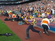 9 August 2008; A delighted Wexford supporter runs onto the pitch after the game. GAA Football All-Ireland Senior Championship Quarter-Final, Armagh v Wexford, Croke Park, Dublin. Picture credit: Daire Brennan / SPORTSFILE