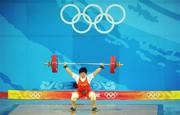 13 August 2008; Chunhong Liu, China, who set world records in both the snatch and clean and jerk, during the Women's 69kg Weightlifting Final. Beijing. Beijing 2008 - Games of the XXIX Olympiad, BUAA Gymnasium, Beijing, China. Picture credit: Ray McManus / SPORTSFILE