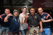 13 June 2015; Austrian hen Melanie Friedrich enjoys an afternoon drink with Scotland supporters, from left: Craig Hamilton and John Paul O'Neill, from Ayreshire, Neiol McLennan, from Aberdeen and Graeme Hamilton, from Ayreshire at the Ballsbridge Hotel ahead of the game. UEFA EURO 2016 Championship Qualifier, Group D, Republic of Ireland v Scotland, Aviva Stadium, Lansdowne Road, Dublin. Picture credit: Ray McManus / SPORTSFILE
