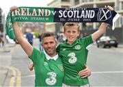 13 June 2015; Republic of Ireland supporters Vincent Brown, and his son Corben, from Glynn Barntown, Co. Wexford, at the game. UEFA EURO 2016 Championship Qualifier, Group D, Republic of Ireland v Scotland, Aviva Stadium, Lansdowne Road, Dublin. Picture credit: Matt Browne / SPORTSFILE