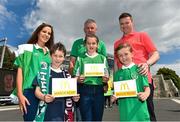 13 June 2015; Pictured, from left to right, are Seán Hickey, aged 8, from Ratoath, Co. Meath alongside his mum Anne-Marie, Taylor Lombard, aged 11, from Ardsallagh, Co. Waterford, with her father Anthony and Daniel Gill, aged 7, from Newbridge, Co. Kildare, alongside his dad Ken at the Aviva Stadium. Seán, Taylor and Daniel won a McDonald’s Future Football competition to become a flag bearer for the crucial Ireland v Scotland European Championship Qualifier at the Aviva Stadium. McDonald’s FAI Future Football is a programme designed to support grassroots football clubs by enriching the work they do at local level. Over 10,000 boys and girls from 165 football clubs in Ireland will take part this year, generating 70,000 additional hours of activity. UEFA EURO 2016 Championship Qualifier, Group D, Republic of Ireland v Scotland, Aviva Stadium, Lansdowne Road, Dublin. Picture credit: Ramsey Cardy / SPORTSFILE