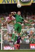 13 June 2015; James McCarthy, Republic of Ireland, challenges Russell Martin, Scotland, for which he received a yellow card. UEFA EURO 2016 Championship Qualifier, Group D, Republic of Ireland v Scotland, Aviva Stadium, Lansdowne Road, Dublin. Picture credit: David Maher / SPORTSFILE