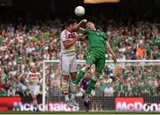 13 June 2015; James McCarthy, Republic of Ireland, challenges Russell Martin, Scotland, for which he received a yellow card. UEFA EURO 2016 Championship Qualifier, Group D, Republic of Ireland v Scotland, Aviva Stadium, Lansdowne Road, Dublin. Picture credit: David Maher / SPORTSFILE