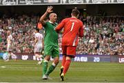 13 June 2015; Jonathan Walters, Republic of Ireland, signals potential time wasting by David Marshall, Scotland. UEFA EURO 2016 Championship Qualifier, Group D, Republic of Ireland v Scotland, Aviva Stadium, Lansdowne Road, Dublin. Picture credit: David Maher / SPORTSFILE